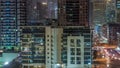 Dubai Marina skyscrapers and promenade aerial night timelapse, Dubai, United Arab Emirates Royalty Free Stock Photo