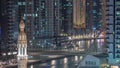 Dubai Marina skyscrapers and promenade aerial night timelapse, Dubai, United Arab Emirates Royalty Free Stock Photo