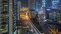 Dubai Marina skyscrapers and promenade aerial night timelapse, Dubai, United Arab Emirates Royalty Free Stock Photo