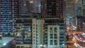 Dubai Marina skyscrapers and promenade aerial night timelapse, Dubai, United Arab Emirates Royalty Free Stock Photo