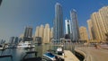 Dubai Marina skyscrapers. View from embankment timelapse Royalty Free Stock Photo