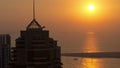 Dubai marina sunset at the sea from top aerial timelapse Royalty Free Stock Photo