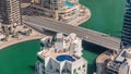 Dubai Marina waterfront and city promenade timelapse from above.