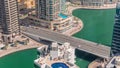 Dubai Marina waterfront and city promenade timelapse from above.