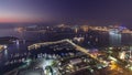 Dubai Marina wide angle Panorama from day to night transition timelapse Royalty Free Stock Photo