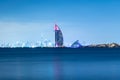 Dubai night landscape showing luxury skyline of modern hotels and skyscrapers. Illuminated Burj al Arab and Burj Khalifa. Royalty Free Stock Photo