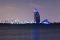 Dubai night landscape showing luxury skyline of modern hotels and skyscrapers. Illuminated Burj al Arab and Burj Khalifa. Royalty Free Stock Photo