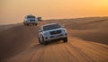 DUBAI - OCTOBER 21: Driving on jeeps on the desert, traditional