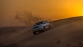 DUBAI - OCTOBER 21: Driving on jeeps on the desert, traditional