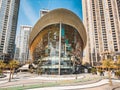 Dubai Opera house in Downtown Dubai, surrounded by skyscrapers and Burj Khalifa, in UAE, United Arab Emirates