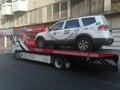 Dubai police car on top of towing truck