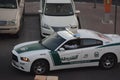 A dubai police vehicle running on the road