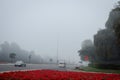 Dubai roads in a foggy weather. United Arab Emirates motorist maintaining safe distance due to poor visibility