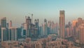 Dubai's business bay towers aerial morning timelapse. Rooftop view of some skyscrapers Royalty Free Stock Photo