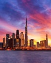 Dubai Skyline with Beautiful Sunset Color and City lights Royalty Free Stock Photo