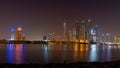 Dubai skyline at night with lights on the water and luxirious skyscrapers of UAE Royalty Free Stock Photo