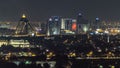 Dubai skyline with Scenic Dubai downtown architecture at night timelapse. Aerial view of numerous skyscrapers near