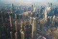 Dubai skyline with skyscrapers in downtown aerial view from above. Morning in futuristic luxury city with many high