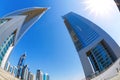 Dubai with skyscrapers against blue sky in UAE