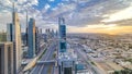 Dubai skyscrapers sunset timelapse evening time. Dubai Metro station and traffic on Sheikh Zayed Road Royalty Free Stock Photo