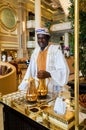 Dubai. In the summer of 2016. The hotel employee pours Arabic coffee in the hotel Park Hyatt. Abu Dhabi