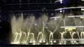 DUBAI - UAE, APRIL 3, 2023: Dancing fountains at Dubai Mall near Burj Khalifa. Action. Beautiful fountain performance at Royalty Free Stock Photo