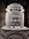 Large head sculpture of the Khmer Buddha created from grey rock. Angkor wat temple is an ancient world civilization located in Cam Royalty Free Stock Photo