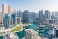 Dubai, UAE. Beautiful aerial top view Dubai Marina promenade and canal with floating yachts and boats Royalty Free Stock Photo