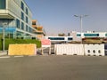 Dubai, UAE - CIRCA 2020: Road closer sign and road blockade near a hospital. Concept of road diversion