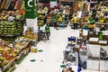 Dubai, UAE - 07.07.2021 - Customers and vendors at Waterfront market, fruits and vegetables section. Market