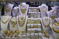 Gold jewelry in the display window Royalty Free Stock Photo