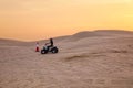 Riding quadbike on the Dubai desert