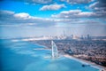 DUBAI, UAE - DECEMBER 10, 2016: Aerial view of Downtown Dubai and Burj Al Arab from helicopter at sunset Royalty Free Stock Photo