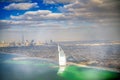 DUBAI, UAE - DECEMBER 10, 2016: Aerial view of Downtown Dubai and Burj Al Arab from helicopter at sunset Royalty Free Stock Photo