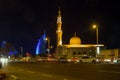 Dubai, UAE - december 31, 2017: Burj Al Arab hotel, Jumeirah Hotel and mosque on Jumeirah  Street at night Royalty Free Stock Photo