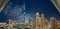 DUBAI-UAE, December 31, 2013: Burj Khalifa Surrounded by Dubai Downtown Towers at night Royalty Free Stock Photo