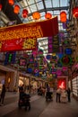 Dubai, UAE - December 1, 2023. Chinatown Dubai Mall. Retail shopping holiday street. Chinese lamps, neon signs on alleys