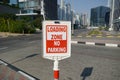 Dubai UAE December 2019 Red and white sign for no parking in the loading zone outside a building. Residential and commercial area