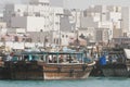 Dubai UAE Dhows old wooden sailing vessels are docked along the Deira side of Dubai Creek.