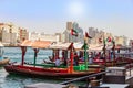 Dubai, UAE - February, 2018: Ancient means transportation - arab boat Abra. Dubai Creek. Water taxi. Royalty Free Stock Photo
