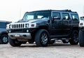 Dubai, UAE: February, 2018 - Black luxury car Hammer parking in desert safari, Dubai, UAE.