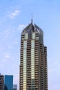 The contemporary building architecture of Al Mesk Tour with interesting top, Dubai Marina Bay