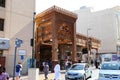 Dubai\'s Old Souk market bustling with tourists. The market is a maze of narrow, crowded alleys