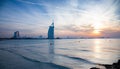 DUBAI, UAE - FEBRUARY 2018 :The world's first seven stars luxury hotel Burj Al Arab at night seen from Jumeirah public beach in Royalty Free Stock Photo