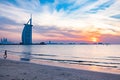 DUBAI, UAE - FEBRUARY 2018 :The world's first seven stars luxury hotel Burj Al Arab at night seen from Jumeirah public beach in Royalty Free Stock Photo