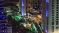 Hotel entrance view in Dubai marina at night from top of skyscraper timelapse Royalty Free Stock Photo