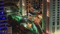 Hotel entrance view in Dubai marina at night from top of skyscraper timelapse Royalty Free Stock Photo
