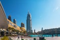 Dubai, UAE - January 2, 2018: Downtown Dubai skyline, view from the Dubai fountain. Modern city cityscape with skyscrapers, sidewa