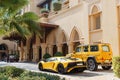 DUBAI, UAE - JANUARY 08, 2019: yellow luxury supercar Lamborghini Aventador Roadster and Gelandewagen in Dubai. Royalty Free Stock Photo