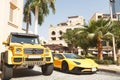 DUBAI, UAE - JANUARY 08, 2019: yellow luxury supercar Lamborghini Aventador Roadster and Gelandewagen in Dubai Royalty Free Stock Photo